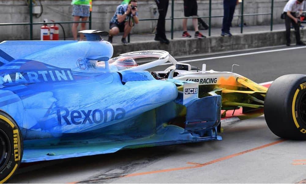 Blue and yellow flow-vis paint on an F1 car duing a practice session. CREDIT: CarThrottle.com