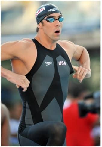 Michael Phelps adjusts his swimsuit, the controversial Speedo LZR Racer. Source: DPA Picture Alliance Archive/Alamy Stock Photo